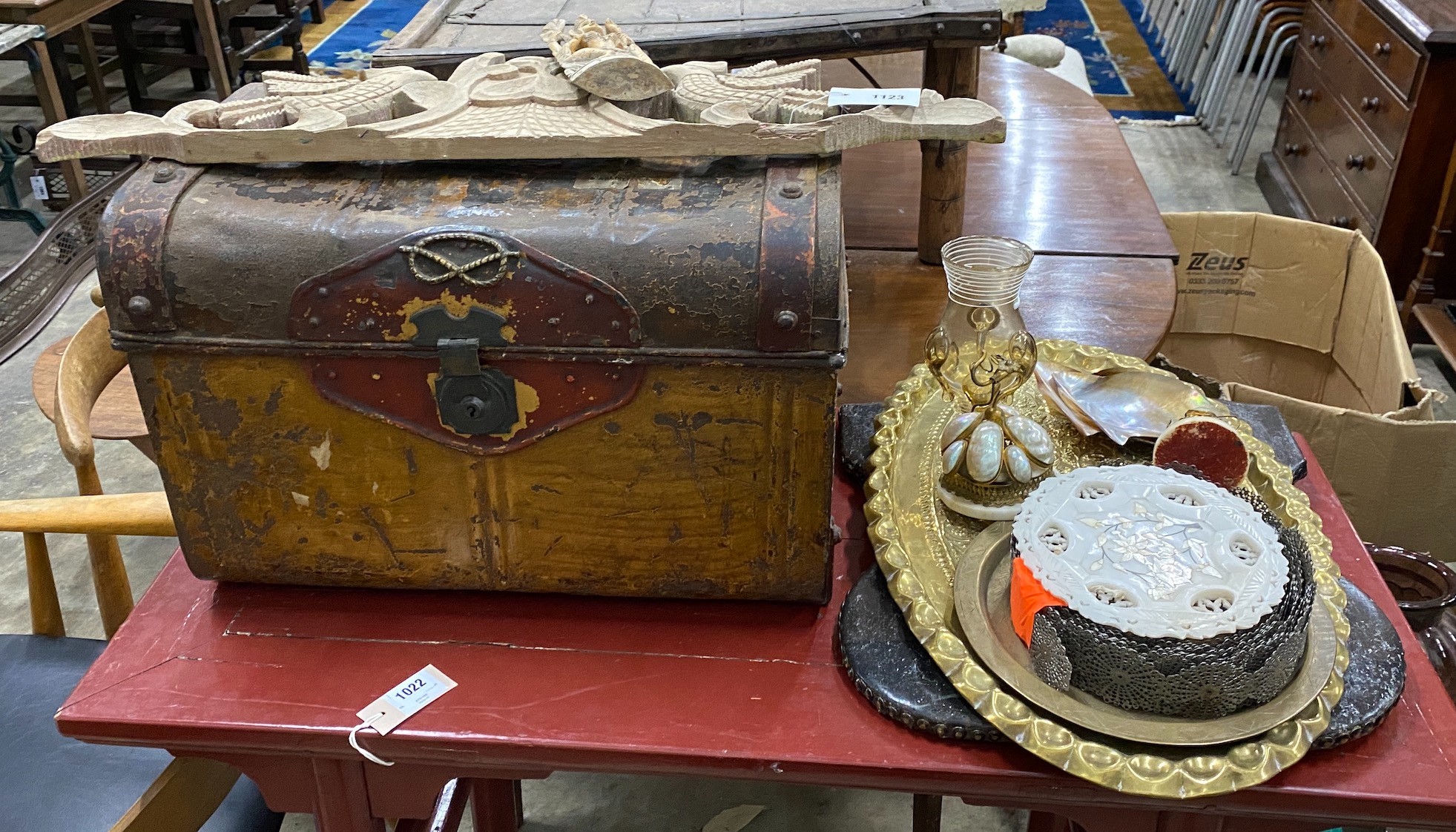A Victorian tin trunk, a painted leather banner, an oval Indian brass tray and sundries.